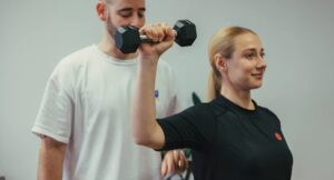 James running a client through one of the best physio exercises for shoulder pain